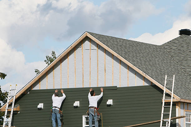 Professional Siding technician working in South Boston, VA